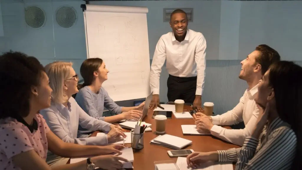 Multi,Ethnic,Aged,And,Young,Millennial,Corporate,Team,Sitting